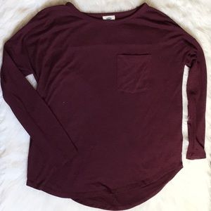 A maroon shirt.